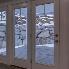 Square Looking out from a home at winter snow