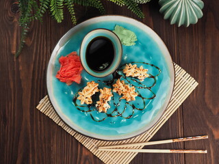 Fresh and tasty sushi on the wooden table