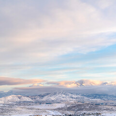 Square Scenic Utah Valley landscape blanketed with snow under overcast blue sky