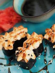Fresh and tasty sushi on the wooden table