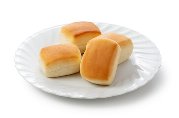 Dinner rolls on a white plate.