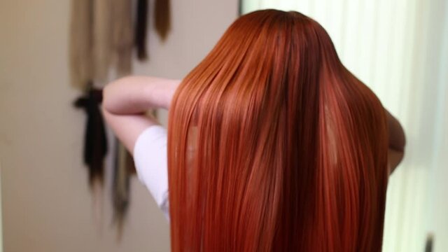 Hair salon, beauty spa. Procedure of hair extensions.