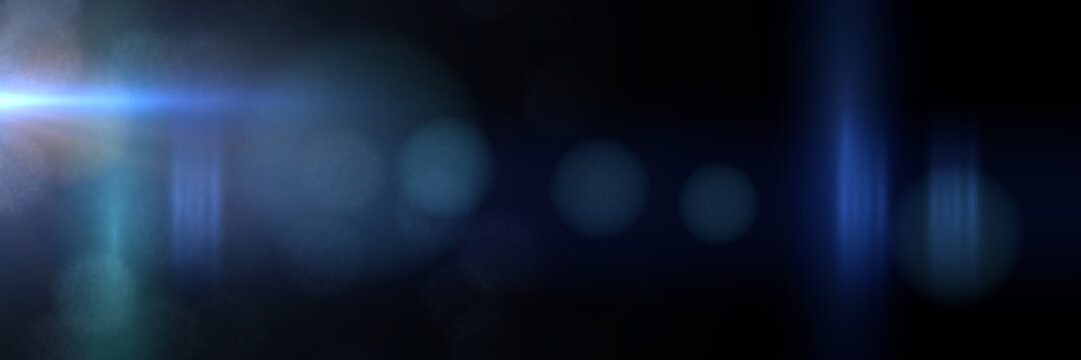 intense blue and mainly off screen lens flare overlay texture with bokeh effect with black background panorama banner