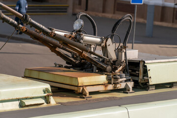 Fototapeta premium Close-up of trolleybus wires on the roof, side view image