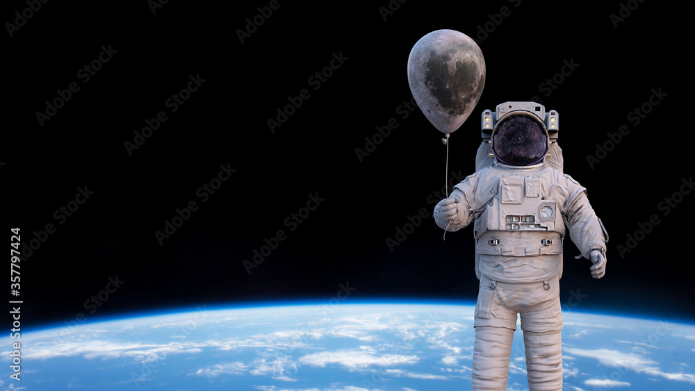Canvas Prints astronaut with moon balloon in orbit of planet earth