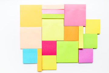 Group of empty coloured post-its as background