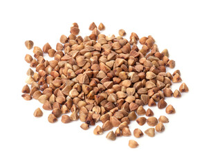raw spilled buckwheat on isolated on a white background