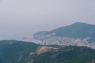 Fototapeta na wymiar View from the mountain to the city of Budva in Montenegro.