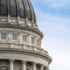 Square crop Utah State Capital building dome with corinthian columns and balcony against sky