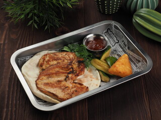 Grilled chicken fillet steak in maracan spices