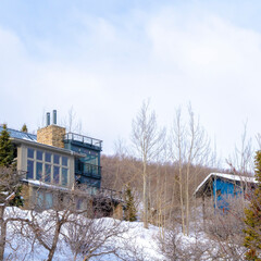 Fototapeta na wymiar Square Mountain homes in snowy Park City Utah residential community in winter