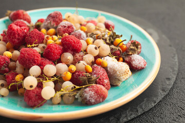 Set of frozen summer berries. Vitamin dessert in  winter.
