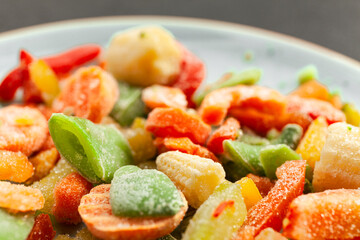 Multi-colored frozen vegetables, summer vitamin set. Healthy food in winter.
