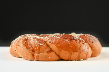 Homemade bread baking on a black and white background