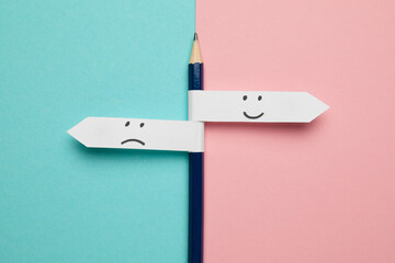 Pencil - direction indicator - choice of sad or happy mood. - obrazy, fototapety, plakaty