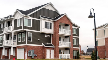 Panorama Three story residential house in America day light
