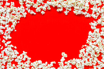 Popcorn mockup on red background top view copy space