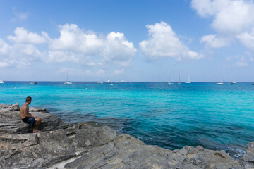 Turquoise water in Formentera Es Calo de San Agusti beach Balearic islands Spain on September 5, 2018