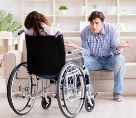 Desperate disabled person on wheelchair