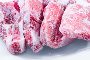 Raw frozen meat. raw pork chops