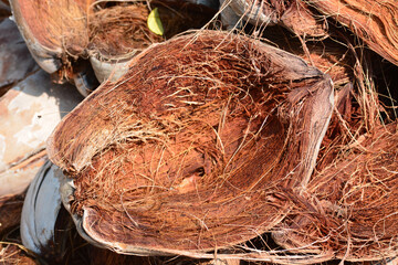 pile of dried coconut shell
