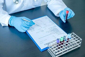 Professional doctors perform find virus tests from samples of blood tests to diagnose coronary...