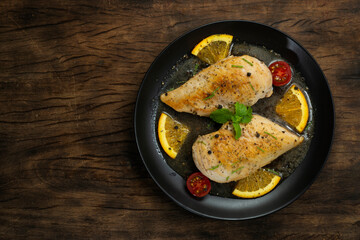 Chicken Piccata with Orange and Butter Sauce GoodTasty on Black Plate The Most Popular