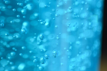 Obraz na płótnie Canvas Blue Hand Wash Gel background and texture macro 