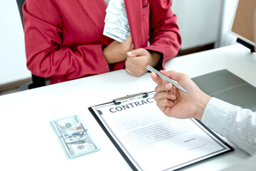 Obraz premium The business owner personally signed the deal, closing the deal by accepting bribes. The idea of ​​corruption and venality concept