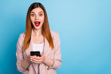 Portrait of astonished shocked positive girl ceo marketer use smartphone impressed read social...