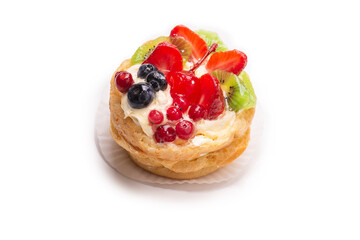 Home made cake with cream and fruits isolated.