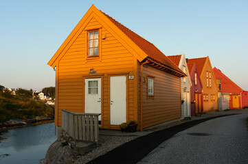 Norwegian houses on island of Fedje in the early morning. Western part of Norway, Nordhordland.