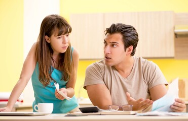 Fototapeta premium Young family struggling with personal finance