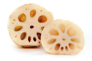 Lotus root slices isolated on white background.