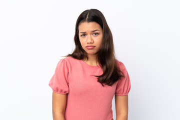 Young Colombian girl over isolated white background with sad and depressed expression