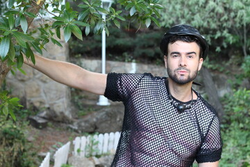 Muscular man wearing see through shirt 
