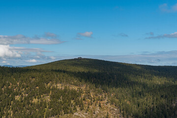Fototapeta premium Vozka hill with rock formation from Cervena hora hill in Jeseniky mountains in Czech republic