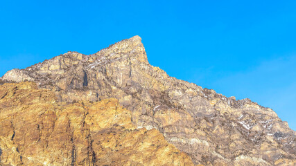 Panorama Steep peak and rocky slopes of a mountain in Provo Canyon Utah on a sunny day