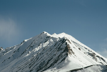 Fototapeta na wymiar Top of snow mountain view in leh ladakh india dramatic image