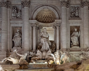 Rome Italy, a partial night view of  the famous trevi fountain with impessive illumination