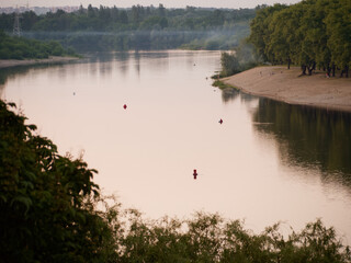 Obraz na płótnie Canvas GOMEL, BELARUS embankment of the Sozh River in the evening