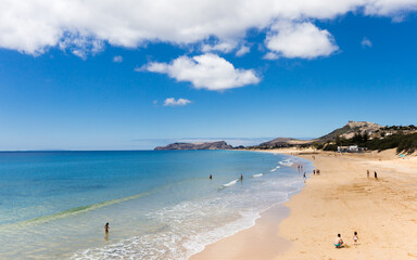 Porto Santo, Madeira, Portugal - June 2020:: Tourists and locals taking a bath on 