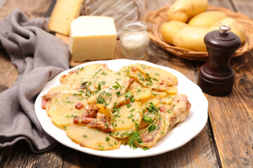 potato with bacon and melted cheese