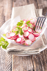 fresh radish with herb in bowl