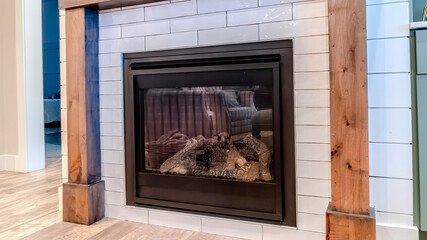 Panorama crop Living room interior of home with close up view of the modern fireplace
