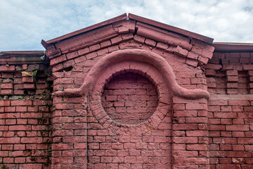 old brick wall in neo-gothic style