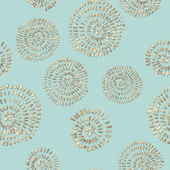 Abstract seamless pattern with 3d golden glittering acrylic paint round spiral circles on pastel green background