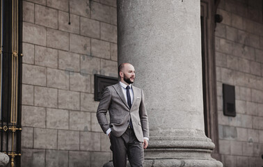 handsome man with a beard in a business suit