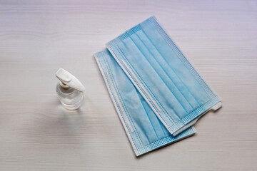 Sanitizer gel and masks to prevent spread the virus.