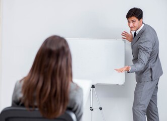 Business presentation in the office with man and woman